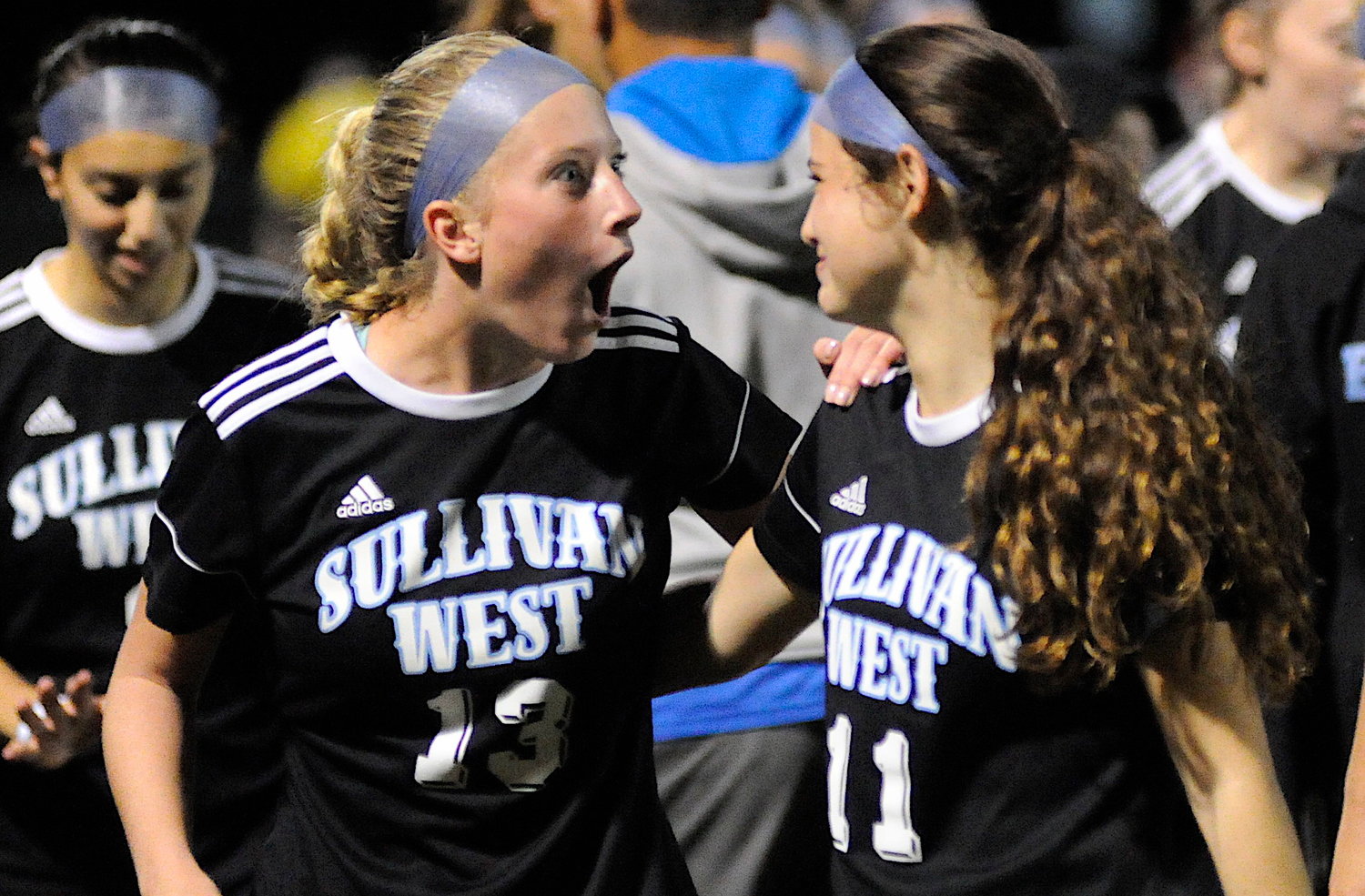 Jubilation. Sophie Flynn and Brooke Nunnari, a sophomore, played in five games and posted two assists. They are pictured with their teammates, celebrating Sullivan West’s 3-1 win over the Lady Spartans of S.S. Seward. “Brooke joined us halfway through the season and was a huge help.”